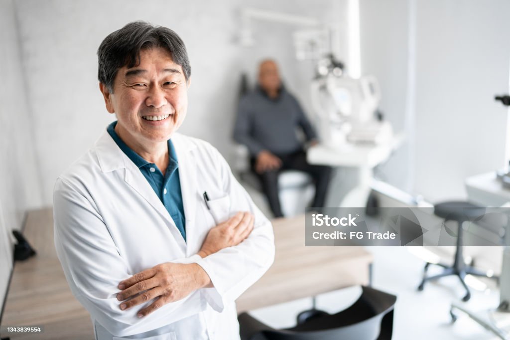 Portrait of a ophthalmologist in a medical clinic Eye Care Professional Stock Photo