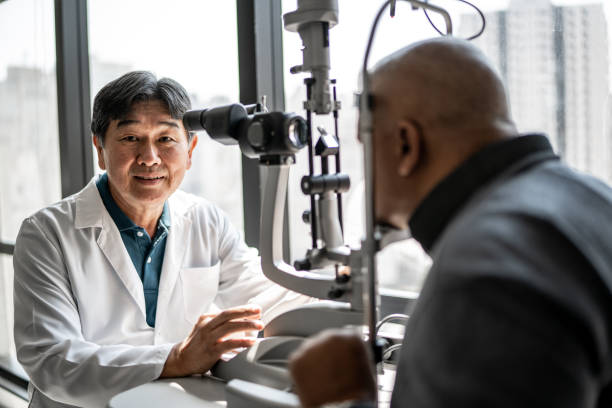 istock Ophthalmologist examining patient's eyes 1343839555