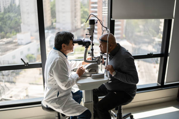 istock Ophthalmologist examining patient's eyes 1343839556