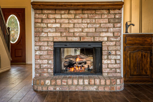 Empty living room in a private residence with a fire place stock photo