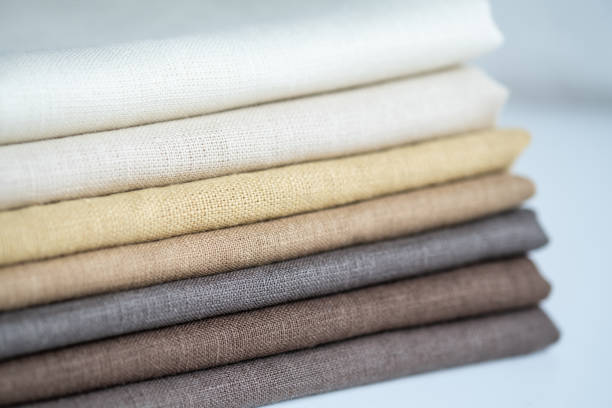 istock Stack of brown linen fabrics, close up 1343844255