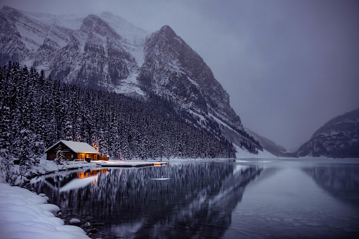 Winter cabin by the lake