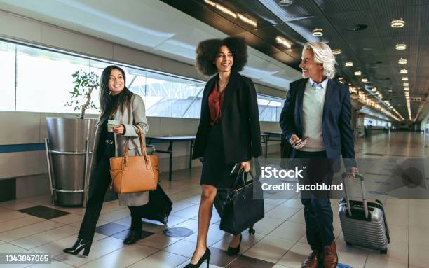 Multi Ethnic People Going On Business Trip Stock Photo - Download Image Now - Business Travel, Business, Airport