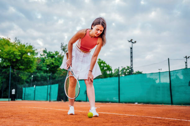 istock Tennis player suffering from knee pain 1343851670