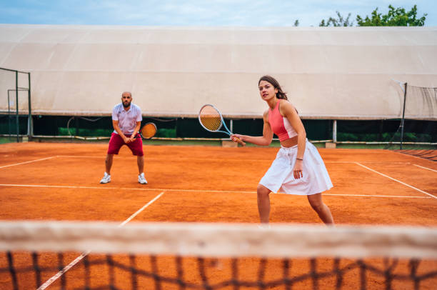 istock Couple playing tennis 1343851839