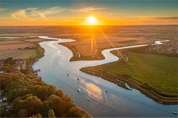 Aerial photo of a sunset over The River Crouch by Hullbidge and South Woodham Ferrers, Essex.