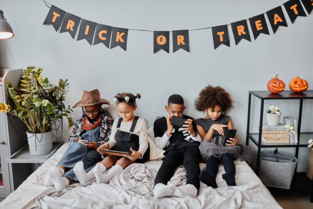 istock Kids Online on Halloween 1343855681