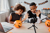 African American Kids Recording Video on Halloween