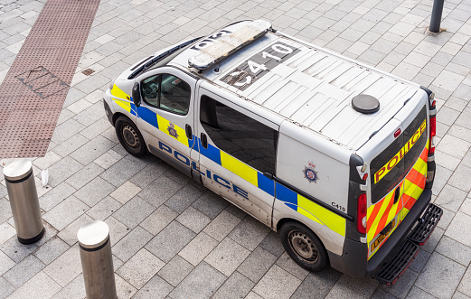 Birmingham, UK - High angle view of a Transport Police van in Birmingham's city centre.