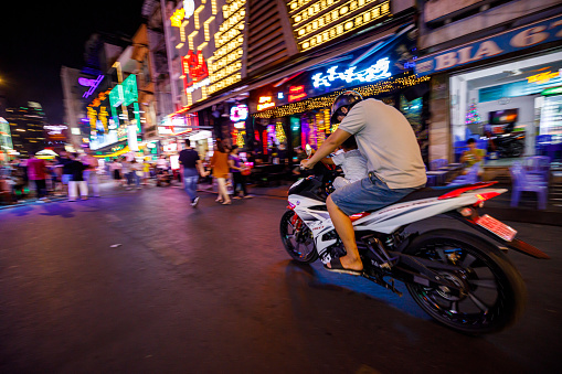 Saigon, Vietnam-September 8, 2018: Many motorcyclists on a Ho Chi Minh City (Saigon) street and roundabout.