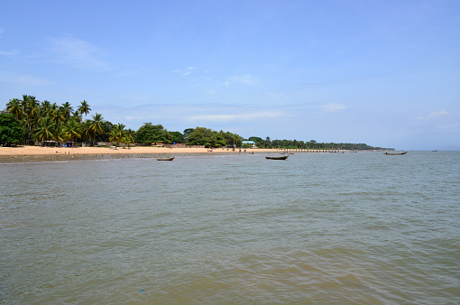 Lungi, Port Loko District, Sierra Leone: Lungi beach, vast extensions of coconut tree lined golden sand on the north side of the Sierra Leone river estuary