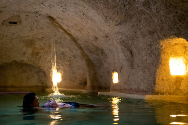 istock Floating massage in a salt cave cenote pool, Mexico 1343866472