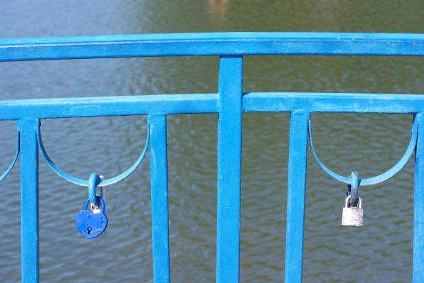 railing over pond at dry sunny summer day