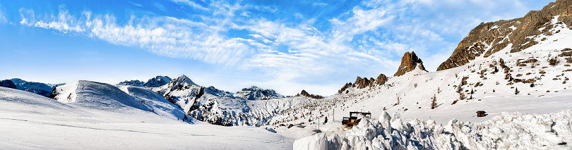 Breath away beautiful Stortind mountain peak and lakes of Flakstadpollen bay, Flakstadøy, Lofoten, Norway nature, winter snow against blue sky, Turquoise color