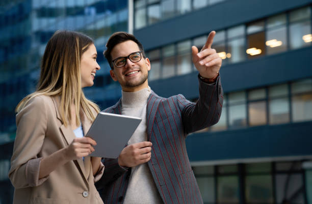 istock Successful business colleagues people working together on digital devices. 1343868302