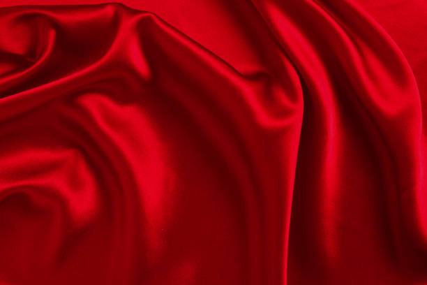istock Red silk or satin luxury fabric texture can use as abstract background. Top view. 1343868650