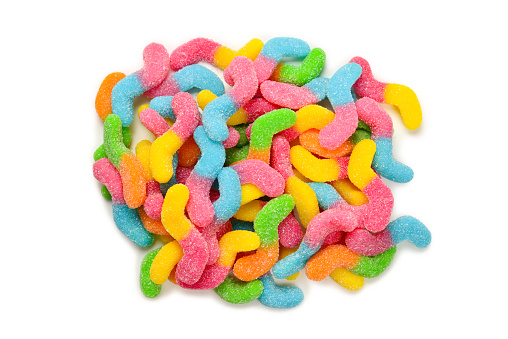 Juicy colorful jelly sweets isolated on white. Gummy candies. Snakes.