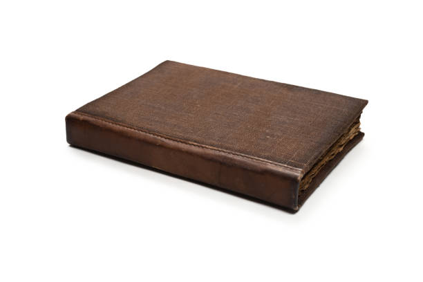 istock An old brown book isolated on white background. 1343868697