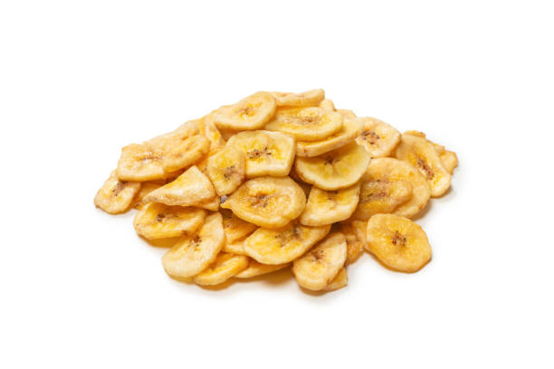 istock Banana chips isolated on a white background. Dehydrated banana. 1343868710