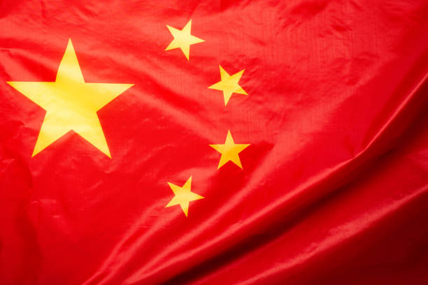 istock China flag waving as a background. 1343868744