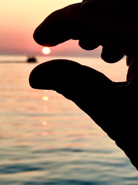 istock Sunset in my fingers 1343870663