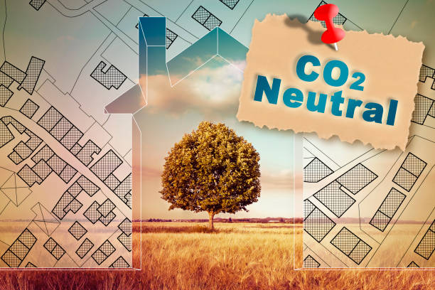 istock CO2 Neutral in construction industry and building activity with home against a natural landscape and imaginary city map