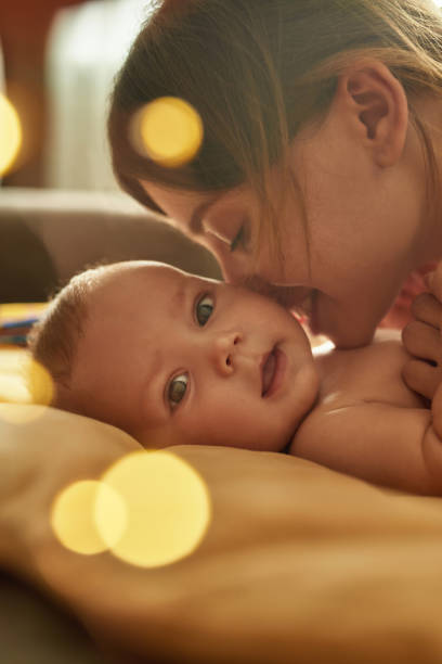 Little baby smell creates strong bond in mom's brain stock photo