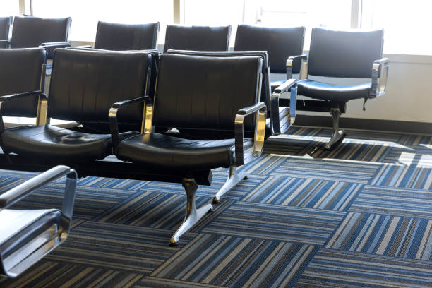istock Empty airport departure lounge terminal waiting area with chairs 1343879779