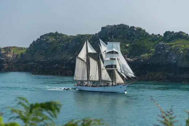 Tallships are real impressive ships with their enormous sails. Entering a tropical bay is a romantic view.