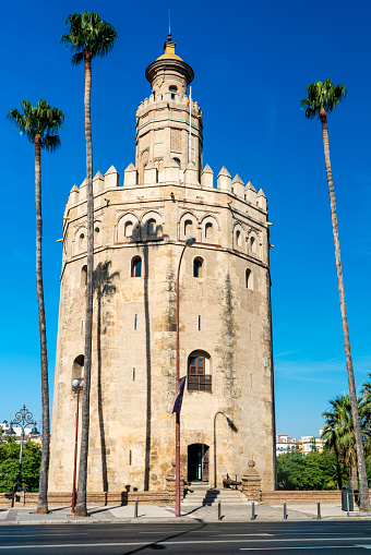 Historic military watchtower in Seville, Spain called the Torre del Oro.
