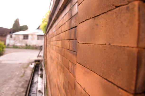 Red grunge brick wall, abstract background texture with vintage style pattern