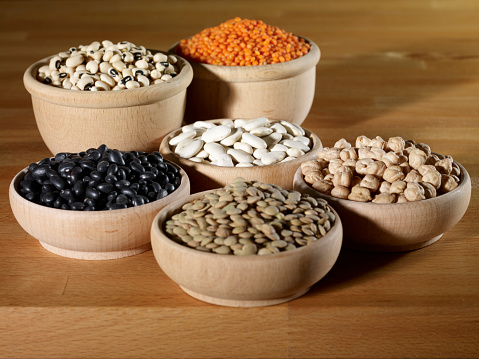 Various pulses in wooden bowl