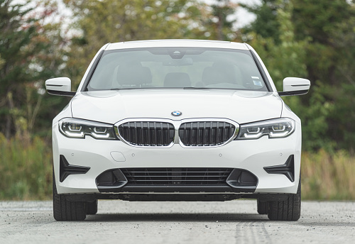 September 29, 2021 - Halifax, Canada - A 2021 BMW 330i xDrive all wheel drive sedan featuring an intercooled turbocharged 2.0L engine.