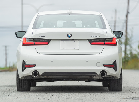 September 29, 2021 - Halifax, Canada - A 2021 BMW 330i xDrive all wheel drive sedan featuring an intercooled turbocharged 2.0L engine.