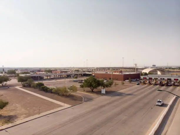 Photo of International Border United States and Mexico at Puente Internacional Córdova de las Américas on a sunny day