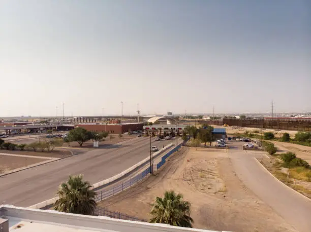 Photo of International Border United States and Mexico at Puente Internacional Córdova de las Américas on a sunny day