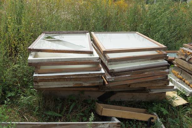 istock garbage from old wooden window frames with broken glass in a heap 1343890623