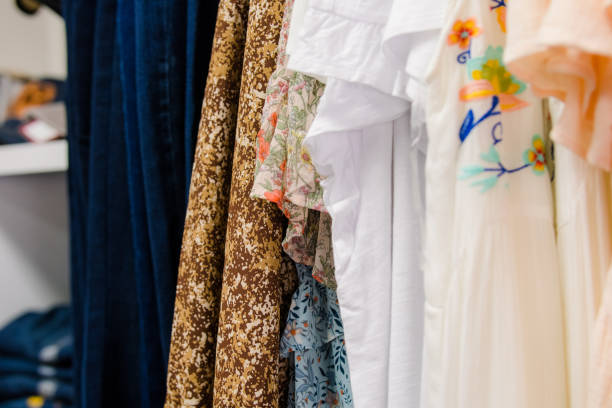 istock Garments hanging on clothes rack 1343896879