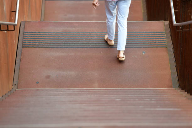 istock Woman on a staircase 1343897798