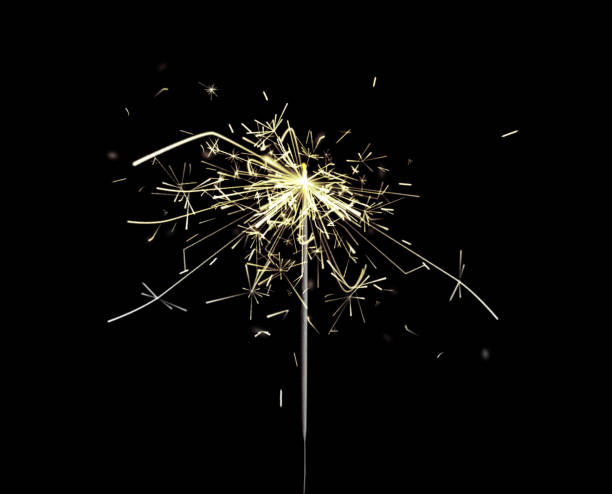 Beautiful sparkler burning on black background. Party decor