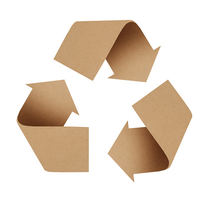 Recycling symbol made of kraft paper on white background