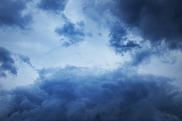 istock Stormy dark clouds in  sky. Clouds background. 1343898592