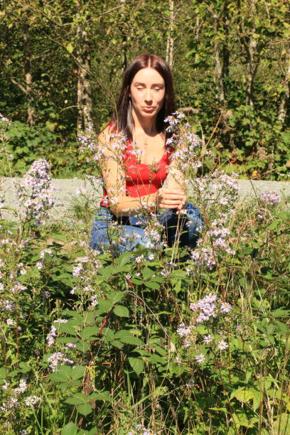istock Woman and Wildflowers 1343900242