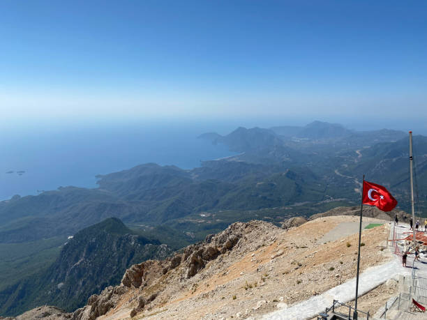 aerial view of olympos ( kumluca district of antalya province, turkey ) and mountain range of central taurus from top of tahtali - greece blue forest national landmark imagens e fotografias de stock