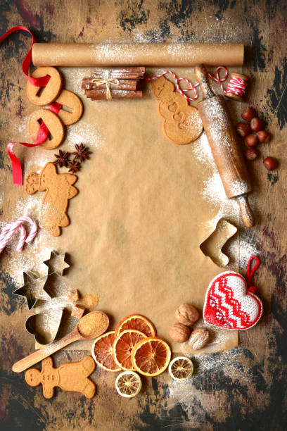 istock Christmas baking background with ginger biscuits and winter spices. 1343909367