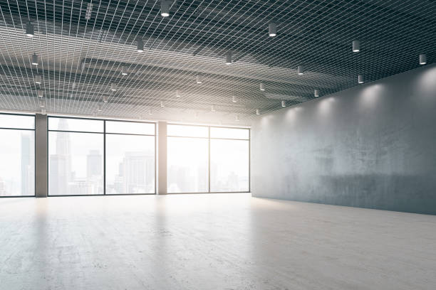 istock Contemporary empty interior with windows, city view and daylight. Design concept. 3D Rendering. 1343910718