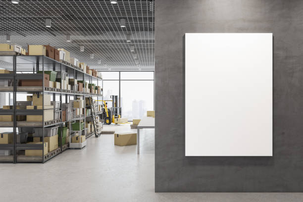 Modern warehouse interior with empty mock up banner on wall, racks, boxes, city view and daylight. Logistics and shipping concept. 3D Rendering.