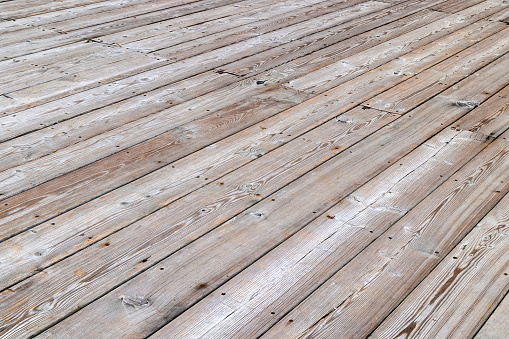 empty dry flat gray wooden deck background with diagonal perspective