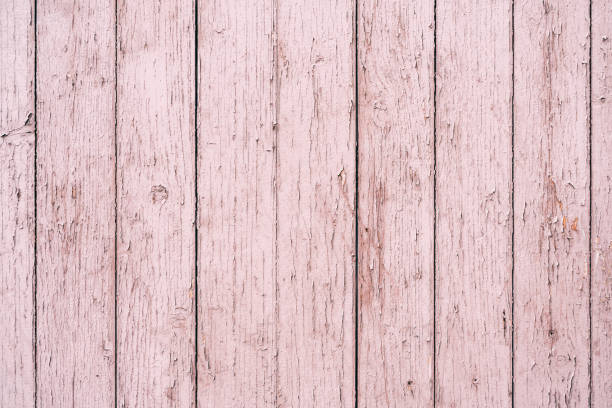 istock Old wooden wall with paint peeling off as background and texture 1343916771