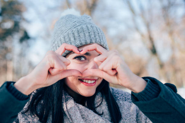 istock Girl Making Heart Shape With Hands 1343916969